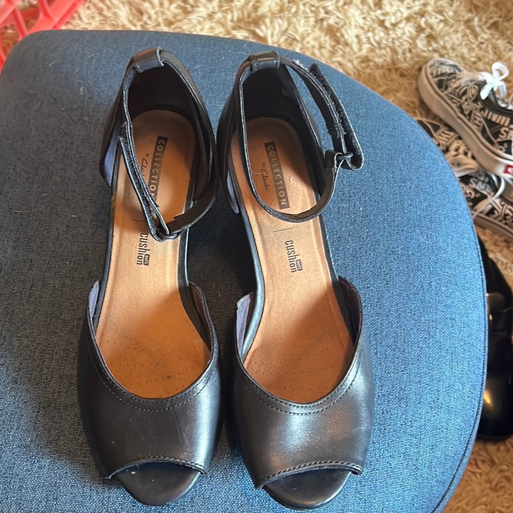 Navy blue Clarks wedge peek toe with ankle strap. Size 8.